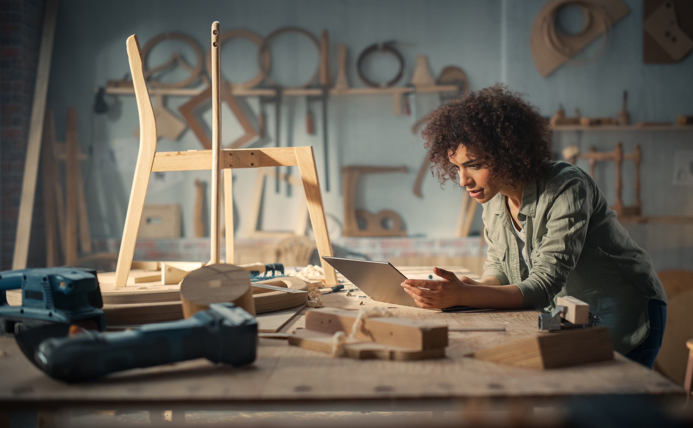 Woman working on industrial design object