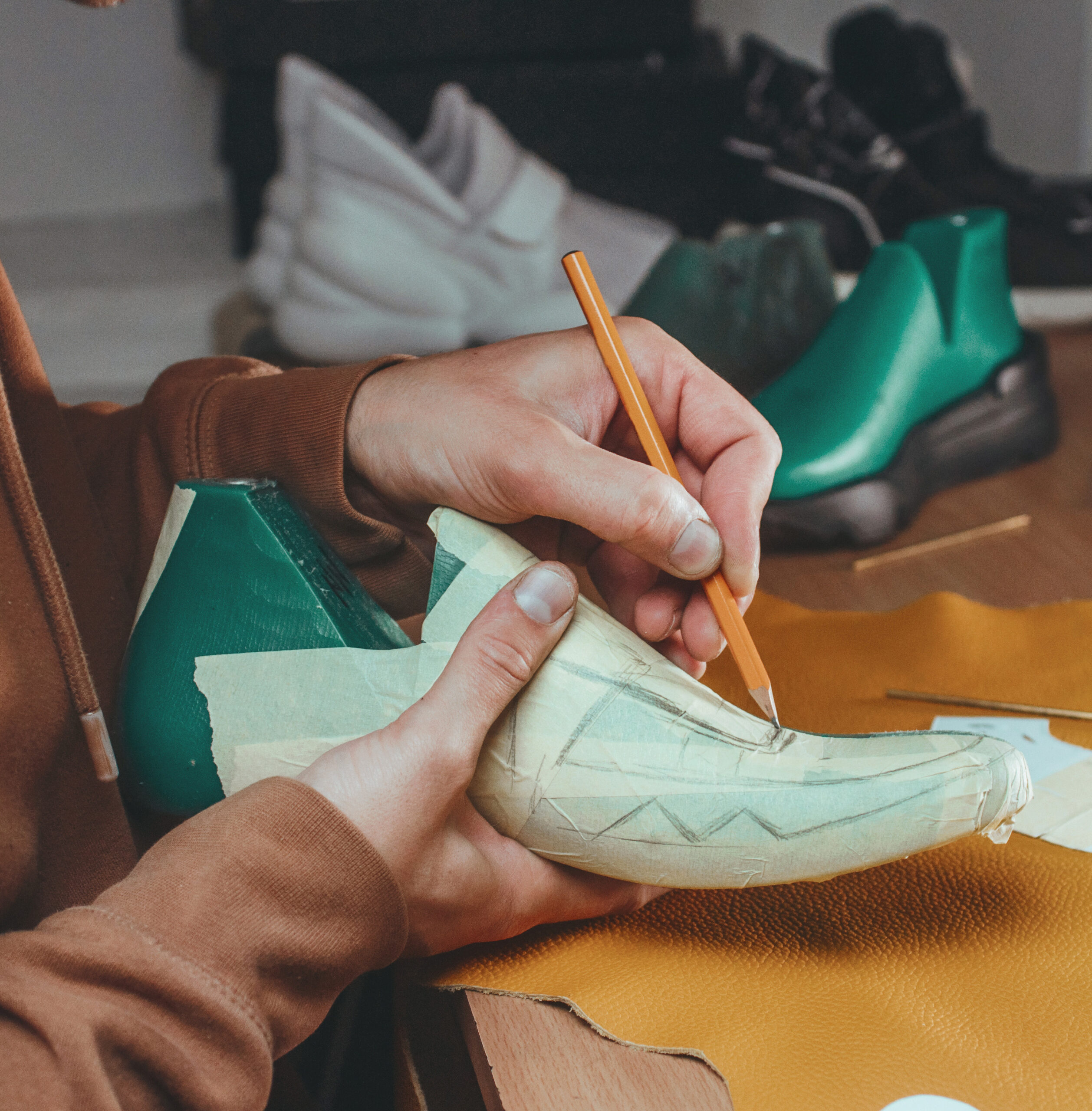 Entrepreneur designing fashion shoes
